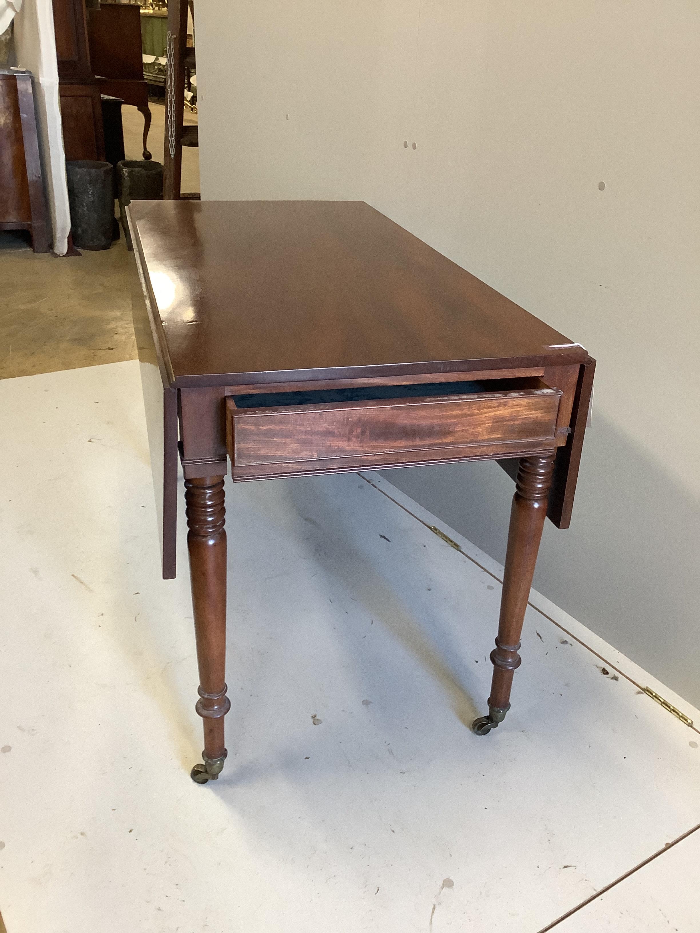 An early Victorian mahogany Pembroke table, width 114cm, depth 59cm, height 74cm together with a Victorian mahogany spoonback nursing chair